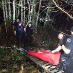 Deputies used a body bag to help carry the unresponsive suspect out of the swamp near Orting. They also had to use a ladder and some pallets to construct a rescue bridge over a creek and out of the swamp. Photo courtesy Pierce County Sheriffs Department