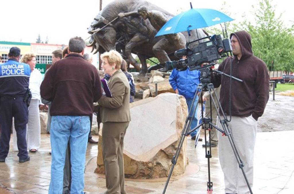 Dorothy Wilhelm was in Enumclaw to film for her Comcast TV show, My Home Town, during the dedication of the citys Logging Memorial statue in June 2008. She was also in Bonney Lake, where former Mayor Bob Young showed her some Bigfoot footprints. Image courtesy Dorothy Wilhelm