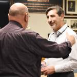 Enumclaw Mayor Jan Molinaro mingles with the audience following his Feb. 19 State of the City address. Kevin Hanson photo