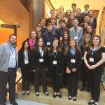 Pictured is the Bonney Lake High DECA team that attended the recent state conference. In front (left) is business teacher Joshua Kern; at right is club adviser Felicia Kern. Submitted photo.