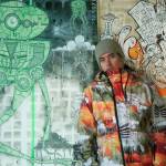 Benji Pierson wears the jacket he designed for famed snowboarder Travis Rice, who wore it in his film, Art of FLIGHT. The film is showing at the Chalet Theater on March 27 at 7 p.m.