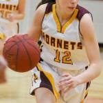 White Rivers Lee Audrey Norris (12) and Chloe Narolski (3) played in Seattle as part of the Senior All-State Games. File photos by Kevin Hanson