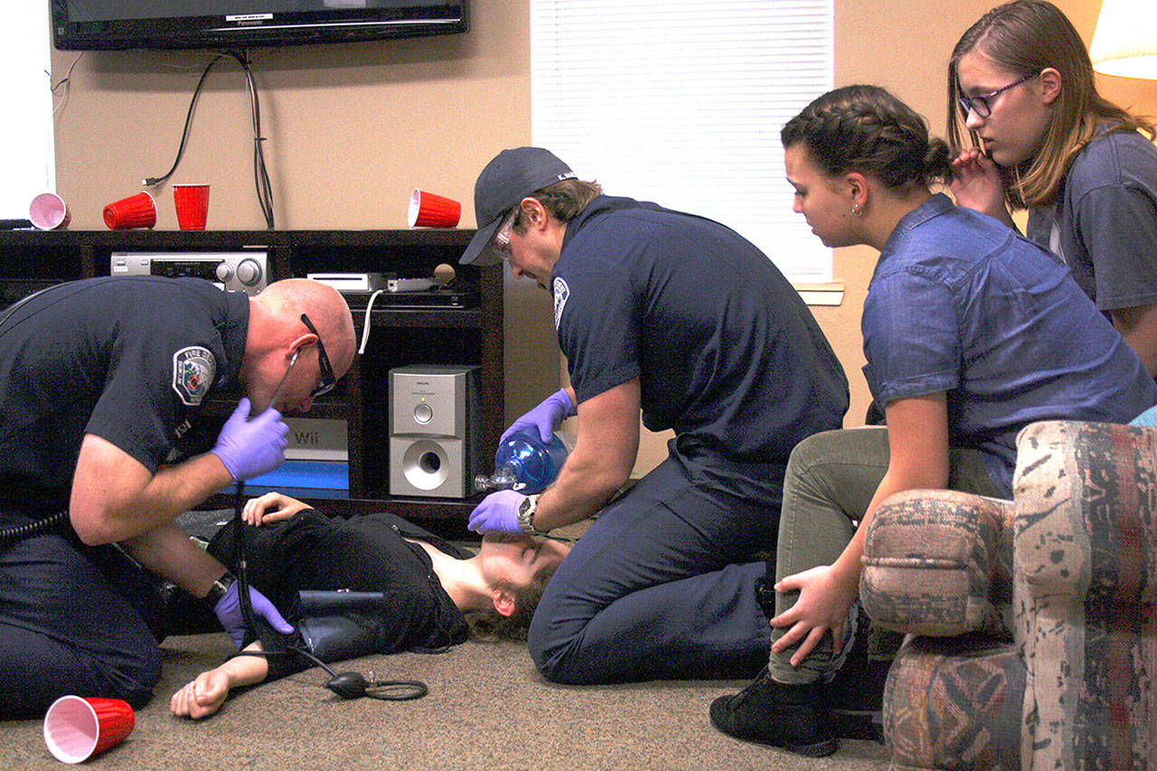 Actors at last years Reality House depicted a scene where a teenager got alcohol poisoning at a party. File photo by Kevin Hanson