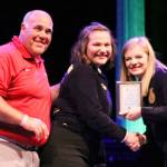 White River student Natalie Gomez receives her Job Interview plaque from State President Sadie Aronson (former White River student), accompanied by FFA Adviser Todd Miller. Contributed photos