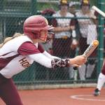 White River senior Noelle Mills prepares to drop a bunt during Fridays district contest against Olympic. Photo by Kevin Hanson