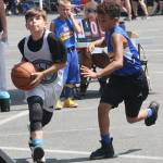 A pair of Youth Division competitors do hoop battle during last years 3-on-3 tournament. File photo by Kevin Hanson