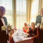 Nelly Mansion recently hosted a high tea event  Arnie Galli, Jr., left and Larry Galli serve Larrys wife, daughter and granddaughter, Molly. Arnie and Larry are the grandchildren of Ernst and Hannah Galli, who lived at Neely Mansion from 1908 to 1914. Photo by Karen Meador.