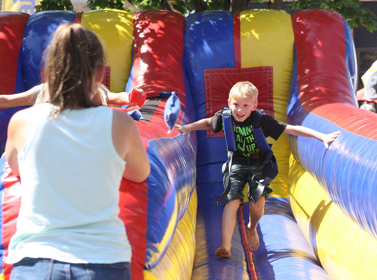 Both free and charged activities for kids and families will be available at this years street fair. File photo by Kevin Hanson
