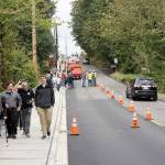 The City of Black Diamond came out Aug. 22 to celebrate the official opening of the pedestrian bridge that passes over the Rock Creek on Roberts Drive. In order to make sure pedestrians and city officials could safely perform the ribbon cutting and have photos taken, the Black Diamond Police Department and Mountain View Fire and Rescue (with Black Diamonds historical fire engine) blocked off the street for a few minutes. Photo by Ray Miller-Still