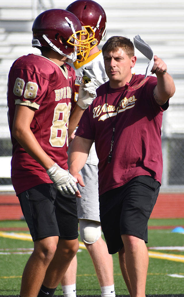 Coach Ken Pirone directs his troops during an afternoon practice on Aug. 29. Photo by Kevin Hanson