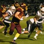 White River Highs Payne Plaster scoots outside the Cascade Christian defense for a late touchdown that gave the Hornets a short-lived lead. The visiting Cougars responded with a game-winning drive and sealed the victory in the games final minute. Photo by Kevin Hanson