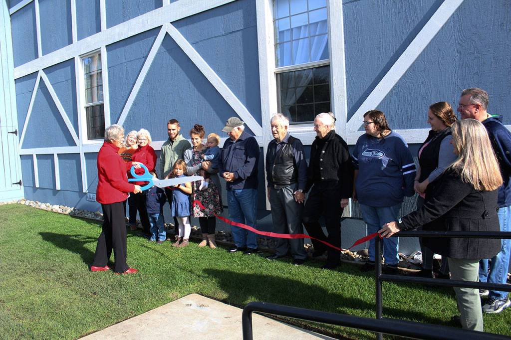 The Danish Sisterhood gathered together on Sunday, Sept. 29, for a small ribbon cutting celebrating the repair of the Danish Hall. Photo by Ray Miller-Still