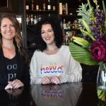 Leading the way at Glow Martini Lounge are sisters-friends-business partners Randi Baker (left) and Kendra Harrington. Photo by Kevin Hanson