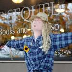 Though the rain appeared to wash out Enumclaws first-ever Scarecrow Festival on Oct. 19, businesses like The Sequel still had their scarecrows out for display in front of their stores or behind glass. Photo by Ray Miller-Still