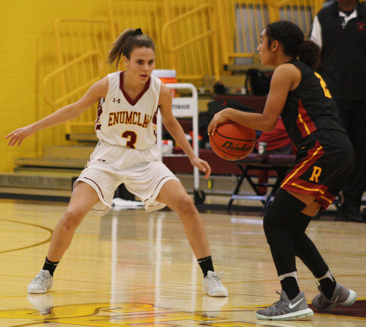 Enumclaw Highs Sawyer Anderson is one of many returning players to the Hornets basketball team. This year, shes No. 11. File photo by Kevin Hanson