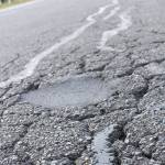 Enumclaw will receive $134,000 to overlay the crumbling Warner Avenue, but city officials have said the road needs more drastic work. Photo by Ray Miller-Still