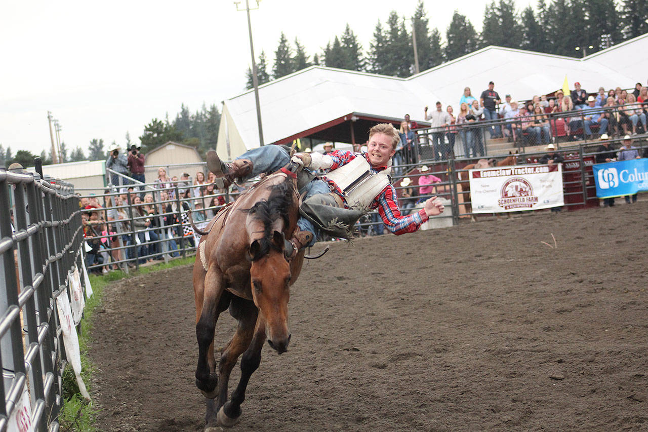 Former EHS student Cole Snyder rode in last Augusts rodeo during the bareback event. Photo by Ray Miller-Still