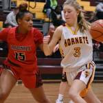 The White River High School girls opened the South Puget Sound League 2A tournament Feb. 5 with a convincing 66-37 victory over the Franklin Pierce Cardinals. Above, Hornet junior Lucy Starkel drives to the hoop. Photo by Kevin Hanson