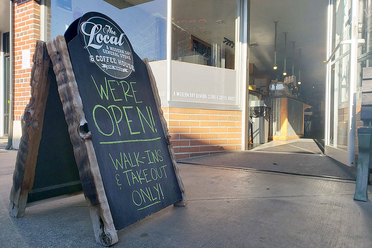 More signs like this one outside The Local in Enumclaw may become more common, since Gov. Jay Inslee has ordered restaurants and bars closed. Photo by Ray Miller-Still