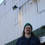 Theorem Cannabis manager Bobby Wilson stands in front of the Kenmore shop on March 19. Andy Nystrom/staff photo