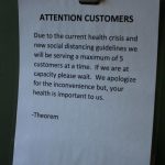 A sign on the front door at Theorem Cannabis in Kenmore. Andy Nystrom/staff photo