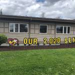 In addition to having these signs posted outside the district office and Enumclaw High School (provided by RK Graphics), the Enumclaw School District also plans to partner with the Enumclaw Senior Center in the near futur to have seniors celebrating seniors. Photo courtesy Enumclaw School Distirct
