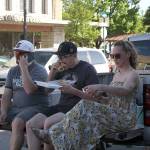 Kaden Loop, participating in the downtown cruise by getting some food from a local restaurant, is chowing down on a bleu cheeseburger from The Lee. Photos by Ray Miller-Still