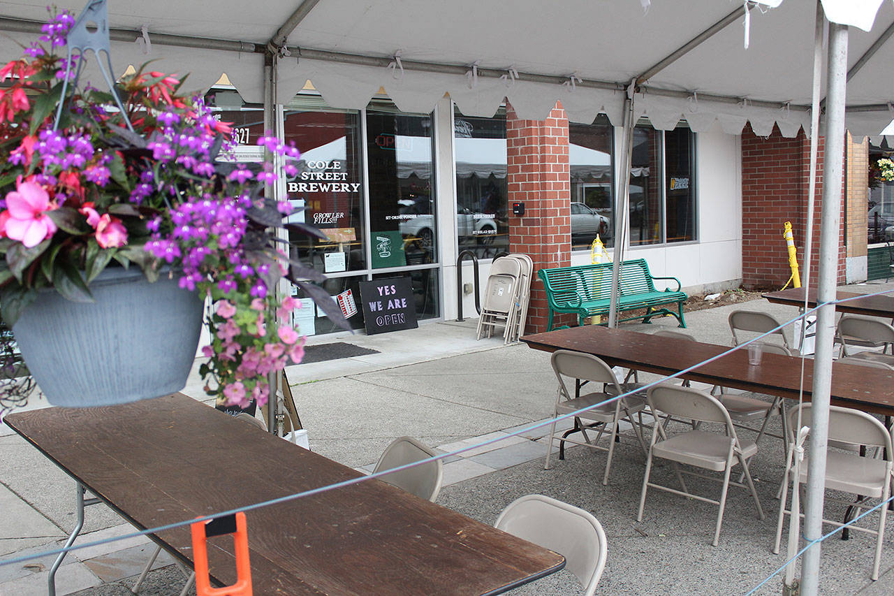 These streateries are all along Cole Street in Enucmlaw, as well as in closed off portions of Myrtle Avenue, Initial Avenue, and Wells Street. Photo by Ray Miller-Still