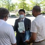 In addition to King County giving Enumclaw thousands of masks, the city also received a donation of masks from the Seattle-based Taipei Cultural Economic Office, headed by Alex Fan, left. Even though we only donated 1,000 mask to Enumclaw this time, we believe it could open up opportunities for mutual sharing and foster deeper relationship in near future, said Fans secretary, Vicki Shih. According to Fan, Taiwans efforts to fight against the COVID-19 pandemic have resulted in less than 500 cases, and deaths have yet to reach double-digits; this is due to the fact that the country was hit hard by a SARS outbreak in 2003, and the country now requires all medical institutions to conduct yearly pandemic training. During a small ceremony outside city hall, Fan and Mayor Jan Molinaro exchanged gifts, which included gifting a copy of the locally-written Theres Only One Enumclaw, by Louis Poppleton, to Fan, who lives in Seattle. Photos by Ray Miller-Still