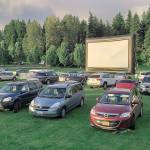 The Enumclaw Expo Centers drive-in movies are shown on a 40-foot screen, with audio put through the radio. Photo by Ray Miller-Still