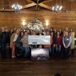 100+ Women Who Care donated $6,000 to the Covington-based Footprints of Fight organization, which offers free services and support like house cleaning, grocery and gas cards to Washington families affected by pediatric cancer. Photo courtesy 100+ Women Who Care