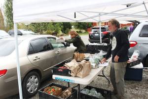 Pictured is Robin Hones of Cascadia Greens and Tanya Wilbanks from The Baker's Cookie, based in Buckley. Photo by Ray Miller-Still