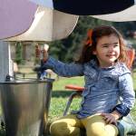 Thomasson Family Farm is alive with family-fun activities, from picking out pumpkins for Halloween to visiting the farm animals and the themed corn maze. Pictured is Olive Alvis practicing her milking skills on "Squirty Gierty"; Wilder Ramos in the pumpkin patch; and Cooper Jones on the zip line. Photos by Ray Miller-Still