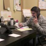 Horacio Castillo has been a case manager with Plateau Outreach Ministries since mid-March. He’s fluent in both English and Spanish, which gives POM the ability to help non-English speaking residents on the Plateau with their utility bills or rent. Photo by Ray Miller-Still