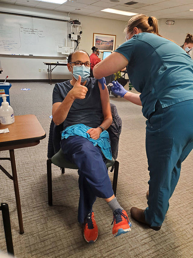 Dr. Amit Desai getting his COVID-19 vaccination at Saint Francis Hospital. Photo courtesy Sarah Ninivaggi
