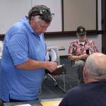 Allan Thomas attended an Aug. 27, 2019 Drainage District 5 meeting with its three new commissioners in order to help them figure out how to set their yearly budget and provide them other information. Photo by Ray Miller-Still