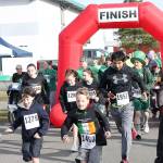Runners taking off during the 2019 St. Paddy's Day 5k. Photo by Ray Miller-Still