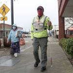 The Pacing Parson, a.k.a Don Stevenson, walking down Cole Street before taking off back to Auburn. Photo by Ray Miller-Still