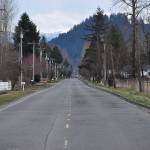 Looking east on March 9 from Mundy Loss Road, the years of wear-and-tear on 112th Street East in Buckley are apparent. The city aims to grind and repave nearly a mile of the road from its intersection at Mundy Loss Road to Highway 165. Photo by Alex Bruell