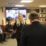 Corrie Koopman Frazier being sworn in.