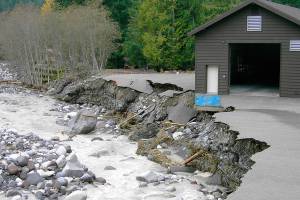 In November 2006, flood damage at Longmire nearly washed the park’s emergency command center into the Nisqually River. Photo courtesy Mount Rainier National Park Archives