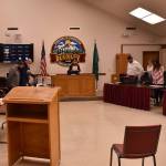 Buckley Mayor Pat Johnson, center, reads a proclamation during the Tuesday evening Buckley City Council meeting committing herself and the council to promoting education and services for the use of helmets in honor of Berrett Wirth Crossley, who died earlier this month after sustaining a head injury while skateboarding without a helmet. Council members in attendance stood during the reading of the proclamation. Photo by Alex Bruell