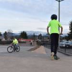 Skateboarders, scooterers and bicyclists enjoy the Buckley Skatepark Tuesday afternoon, displaying a variety of attitudes toward helmet wearing. Photo by Alex Bruell