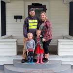Luke, Sarah, Remi, and Ryker Lenihan in front of their new home. Contributed photo