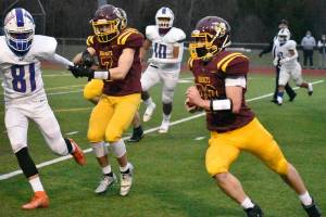 White River's Friday night victory over the visiting Washington Patriots was sparked by a ground attack. Photo by Kevin Hanson