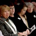 Kathy Parks and family members listen to speakers during the Gary Parks Remembrance ceremony at Everett Community College in 2012. From left: Kathy Parks, daughter Jennifer Parks, granddaughter Marissa Van Ry, Carol and bother John Parks. (Michael OLeary / Herald file)