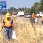 Adopt-A-Highway volunteers pick up roadside litter alongside I-5 in the Seattle area in 2019. Photo courtesy Washington State Department of Transportation