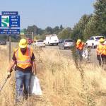 Adopt-A-Highway volunteers pick up roadside litter alongside I-5 in the Seattle area in 2019. Photo courtesy Washington State Department of Transportation
