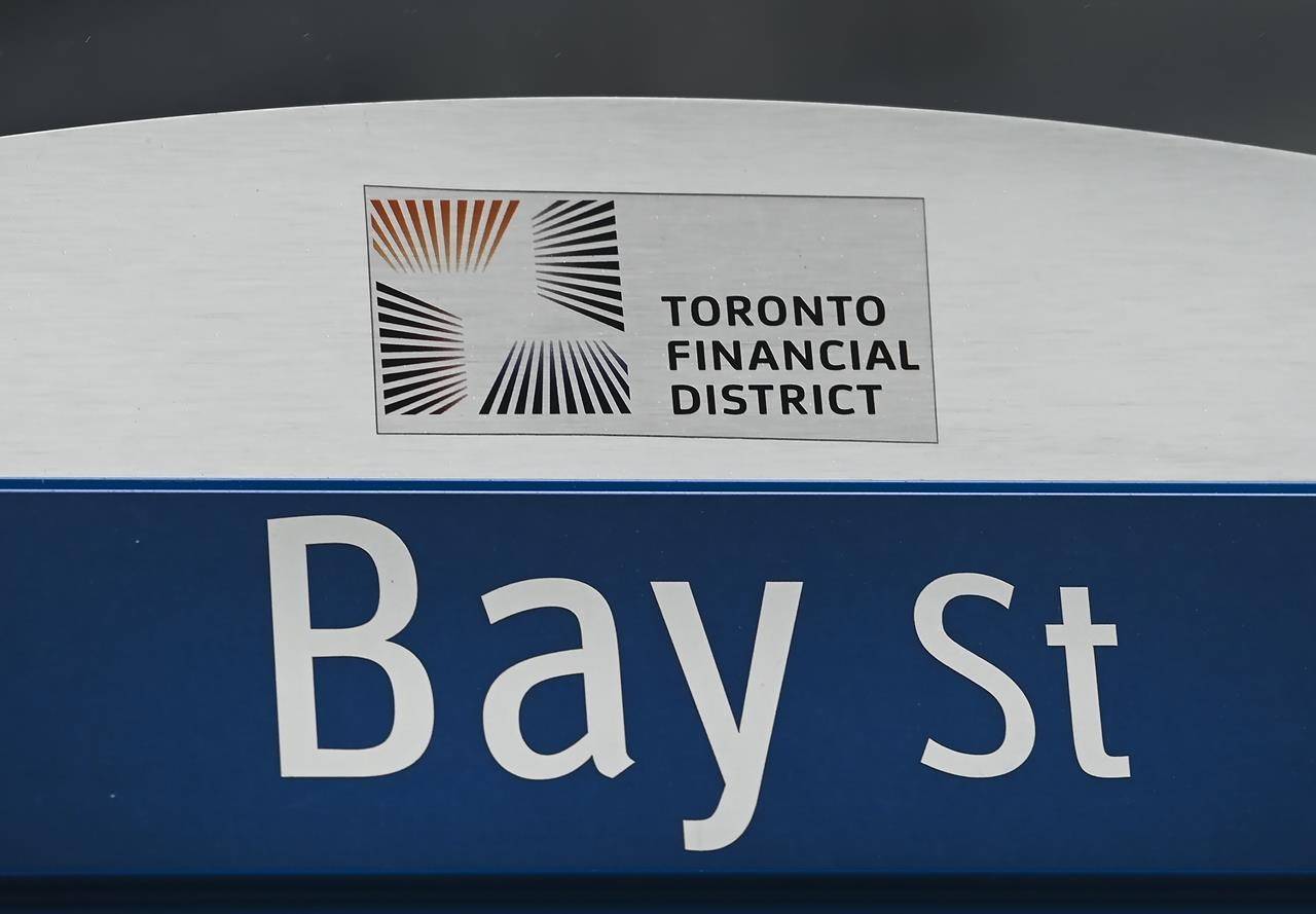 A street sign along Bay Street in Toronto's financial district is shown on Tuesday, January 12, 2021. THE CANADIAN PRESS/Nathan Denette