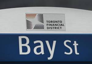 A street sign along Bay Street in Toronto's financial district is shown on Tuesday, January 12, 2021. THE CANADIAN PRESS/Nathan Denette